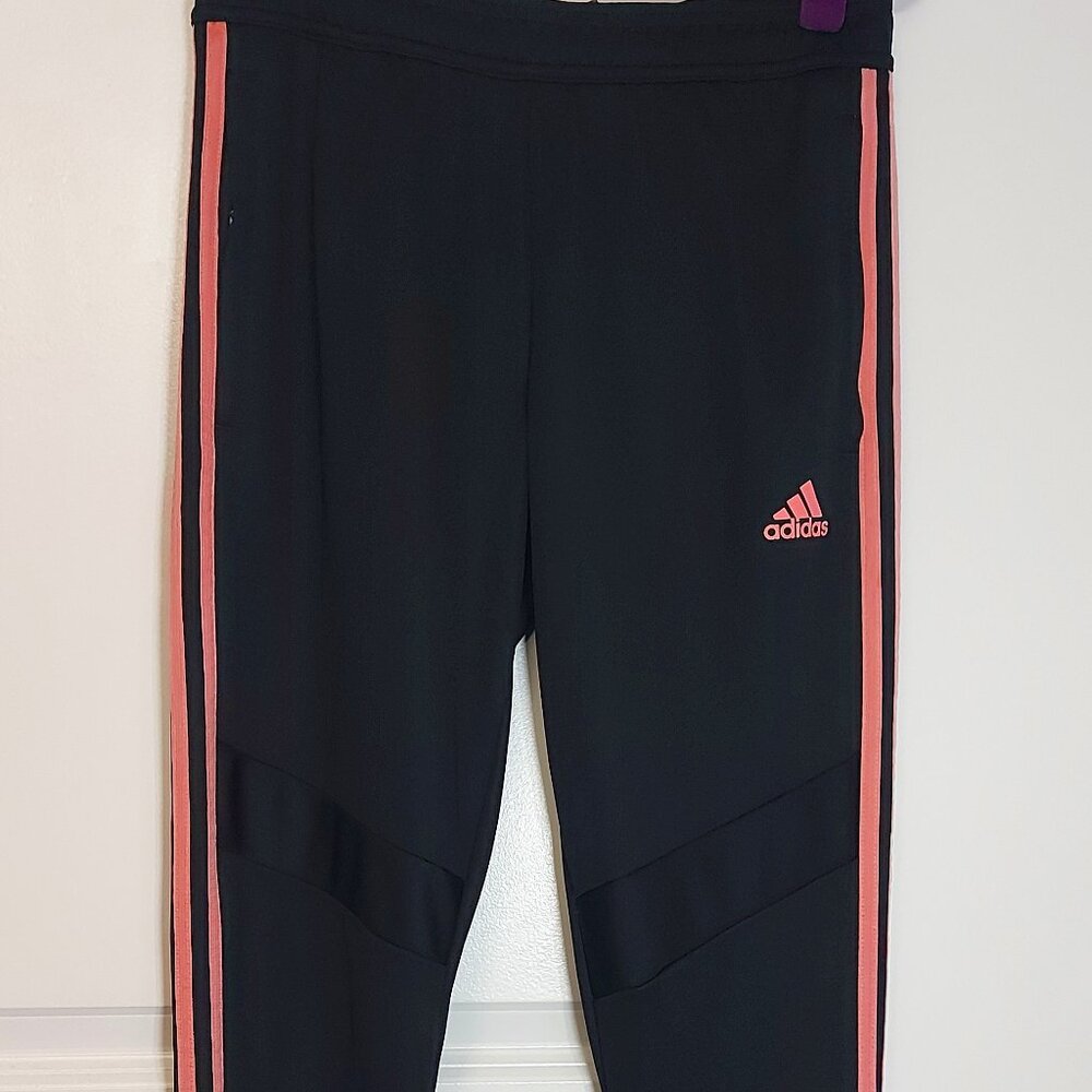 Adidas tracksuit bottoms with pink stripes and ankle zip